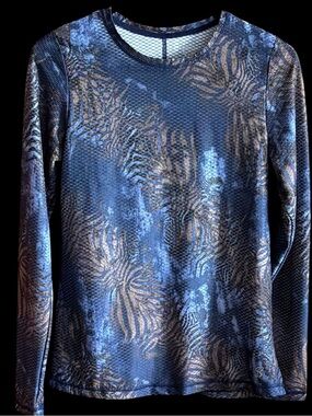 Women's long sleeve Sofibella top for active sports. Matching skorts available.